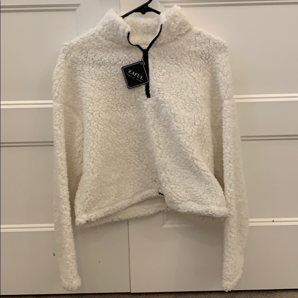 White fuzzy sweater brand new with tags!